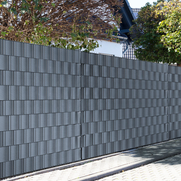 Polypropylene wind and privacy screen strips in anthracite, 26 meters long by Zaunpaket24, rolled and ready for installation.